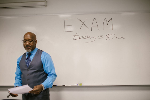 What is the passing score for the MB 920 exam?