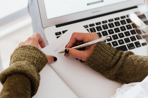 What is the passing score for the PL200 exam?