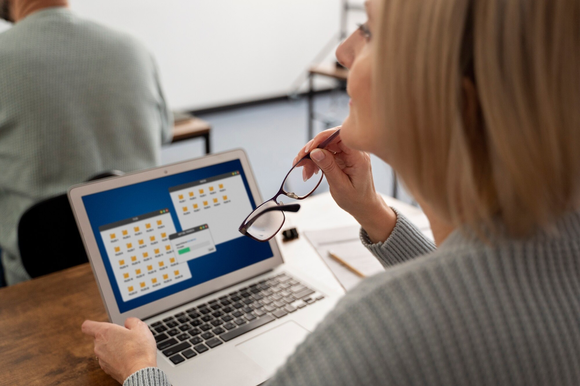 What is the passing score for the MB-910 exam?