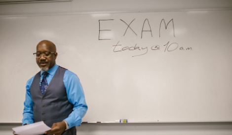What is the passing score for the MB 920 exam?