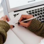 What is the passing score for the PL200 exam?
