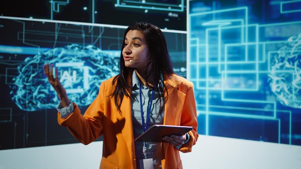 Instructor delivering an Artificial Intelligence course in Sydney with visual AI models and digital technology background